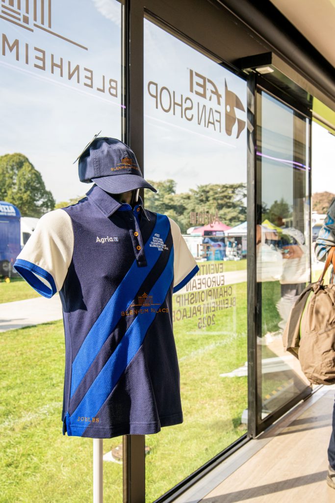 FEI Eventing European Championships branded equestrian merchandise displayed inside Pulse Drop Deck hospitality trailer at Blenheim Palace