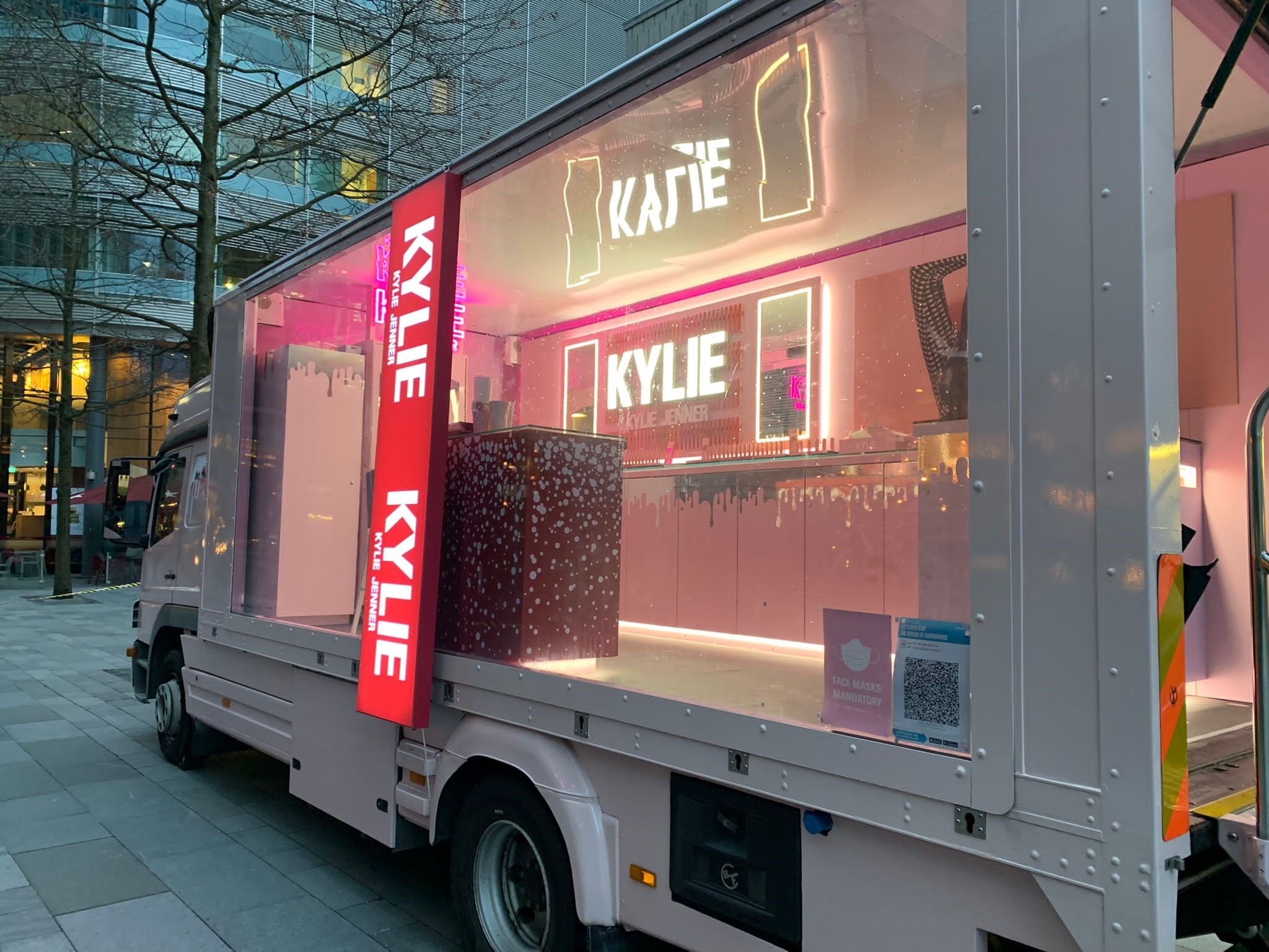 Transparent Showcase Truck by The Clear Idea for Kylie Cosmetics, pink-wrapped beauty roadshow truck exterior during UK brand launch activation