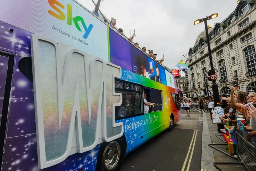 LED HyperBus promotional bus close-up showing WE Pride content on 8.5 metre LED screen with Sky rainbow wrap during London Pride parade