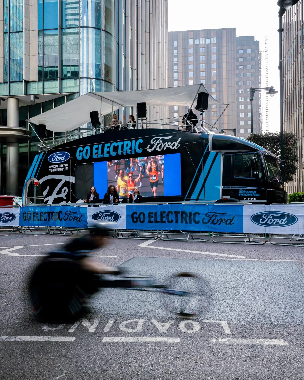 LED ShowTruck exhibition truck side profile with Ford Go Electric branding and LED screens at London Marathon